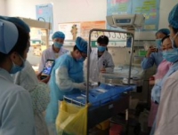 我院新生儿科帮扶甘孜州人民医院首例经外周静脉中心静脉置管（PICC）新生儿康复出院