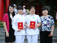 祝贺徐敏、罗群老师荣获“四川大学2014年度十佳护士”称号