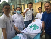 锦江新院区向老院区转运首例急诊病人
